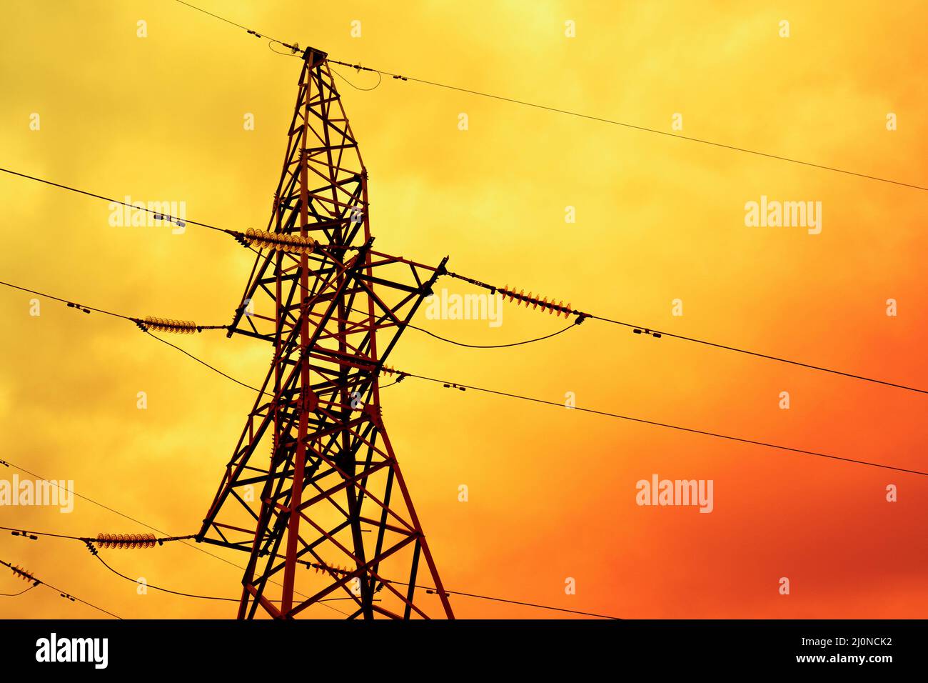 Silhouette of High voltage tower on the sunset Stock Photo - Alamy