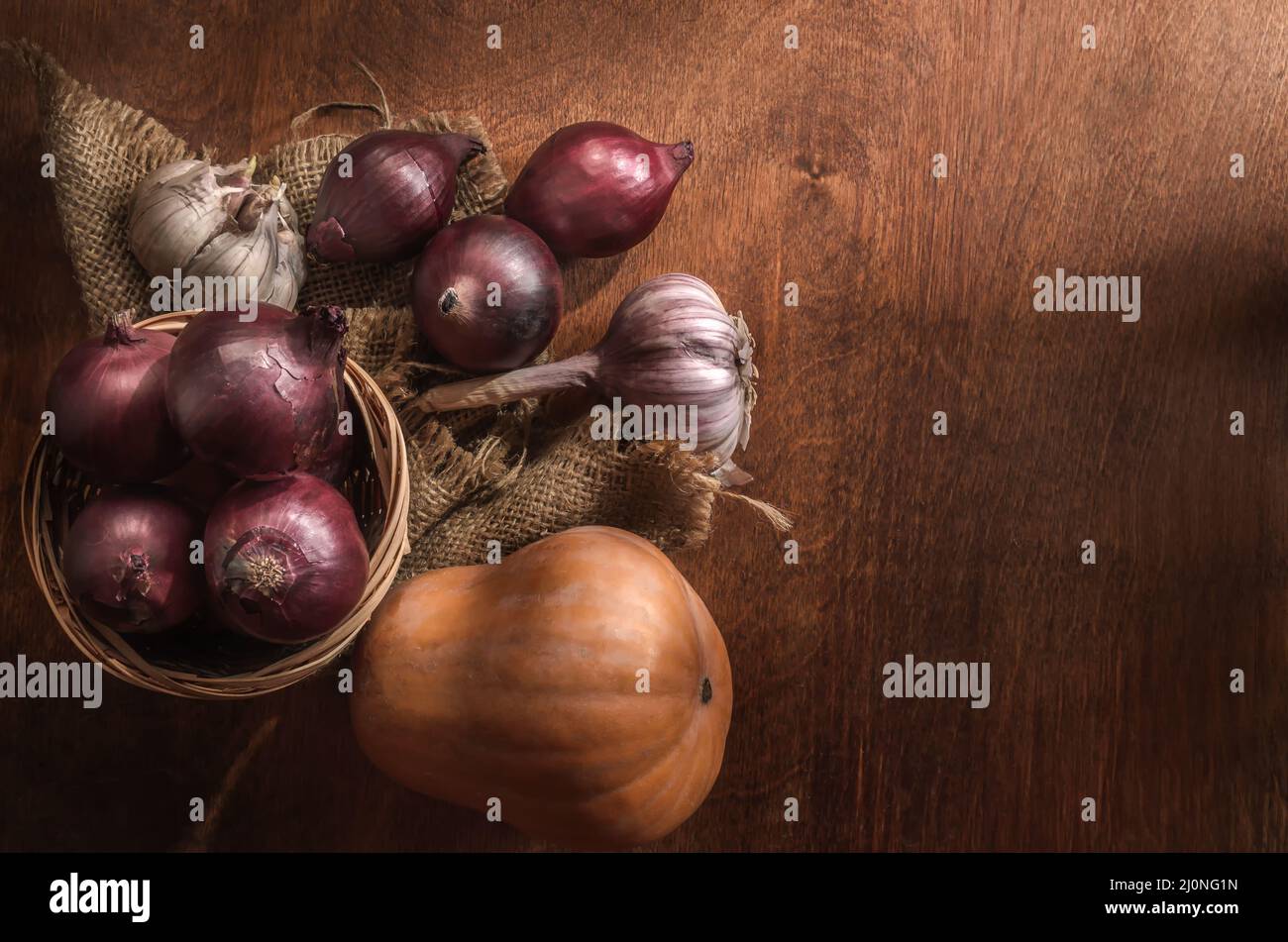 Vegetables on a dark wooden background in a rustic style Stock Photo