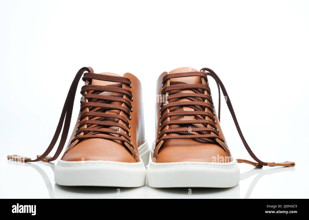 Front view of brown leather shoes. isolated on studio background Stock Photo