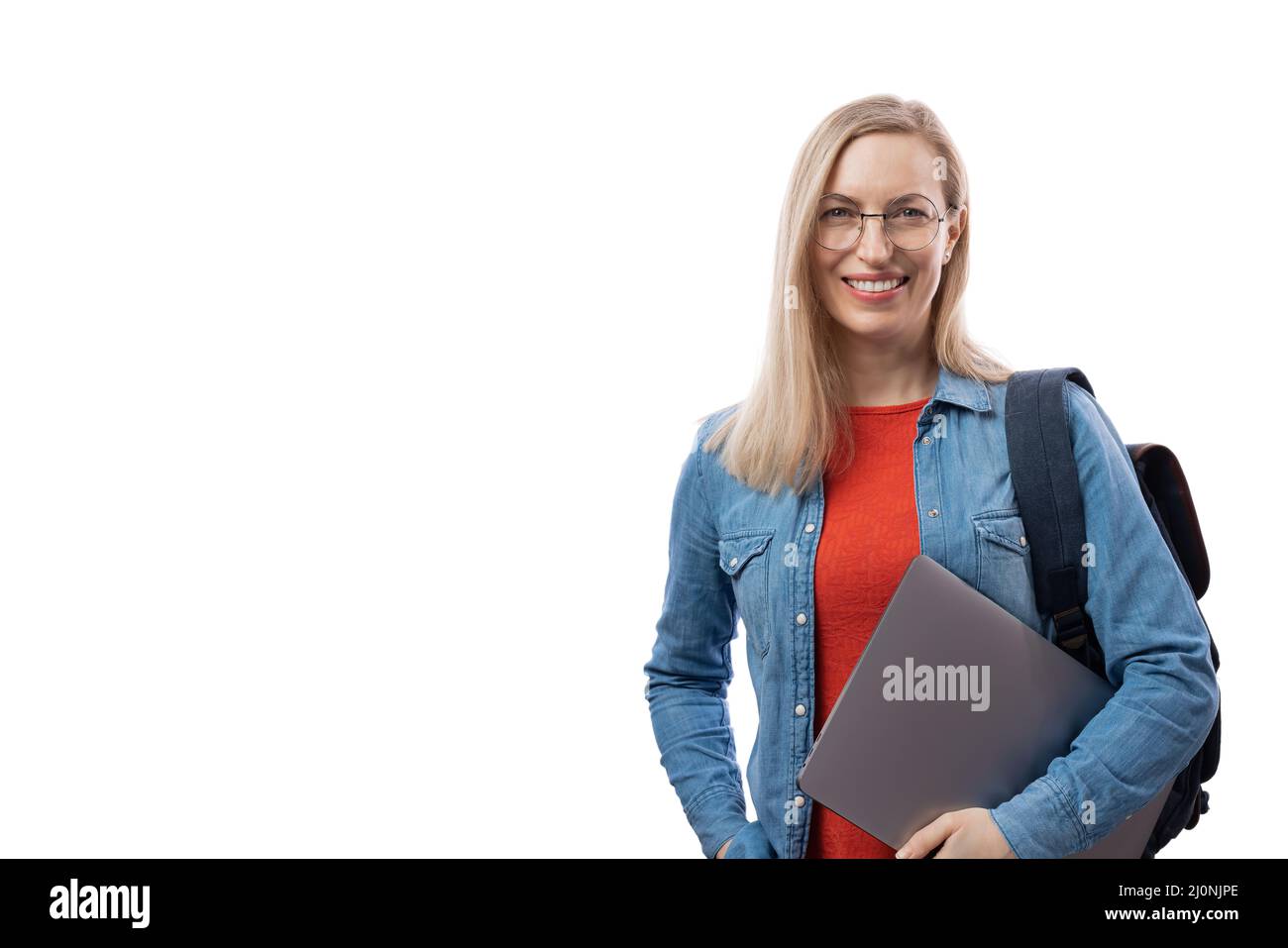 Female student with laptop in studio Stock Photo