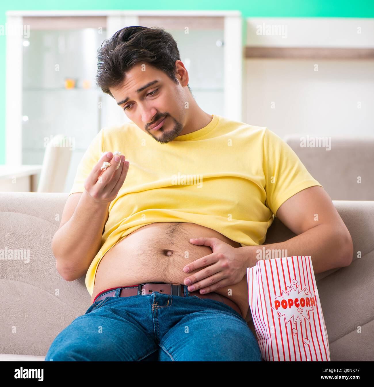 Young fat man in dieting concept Stock Photo