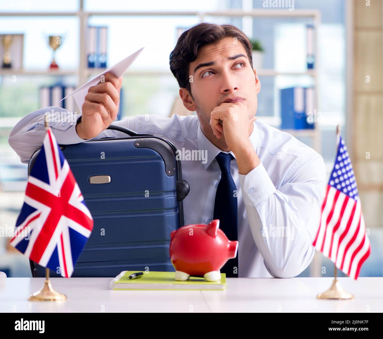 Sales agent working in travel agency Stock Photo