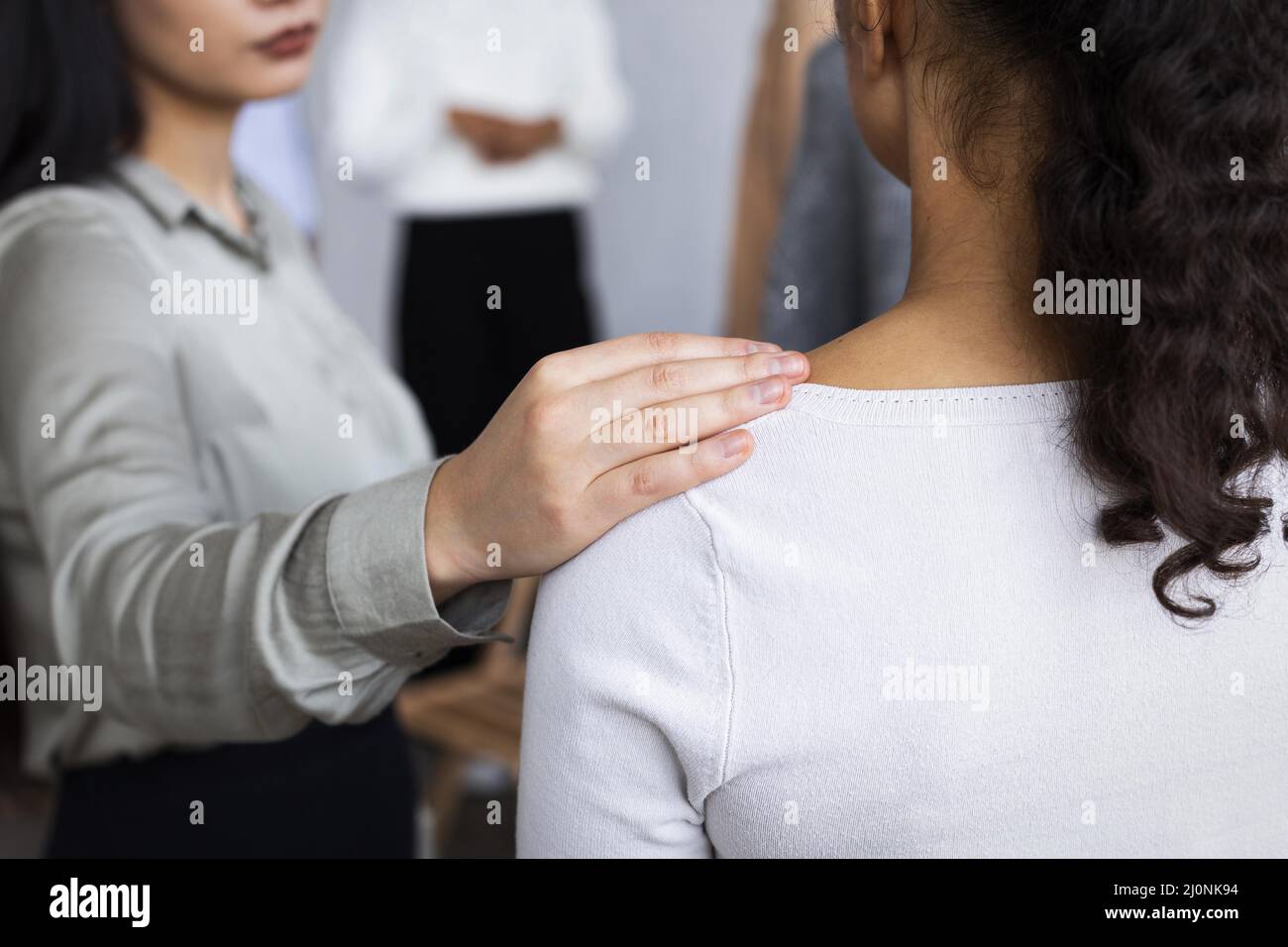 Woman consoling person group therapy session. High quality and resolution beautiful photo concept Stock Photo