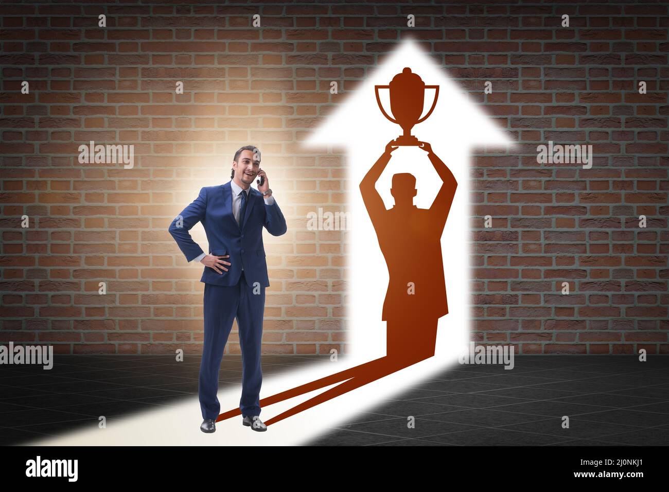 Businessman dreaming of top prize in business concept Stock Photo