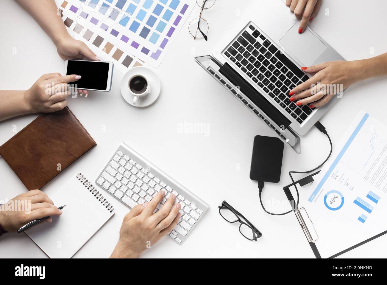 Top view office desk assortment for graphic designers. High quality and