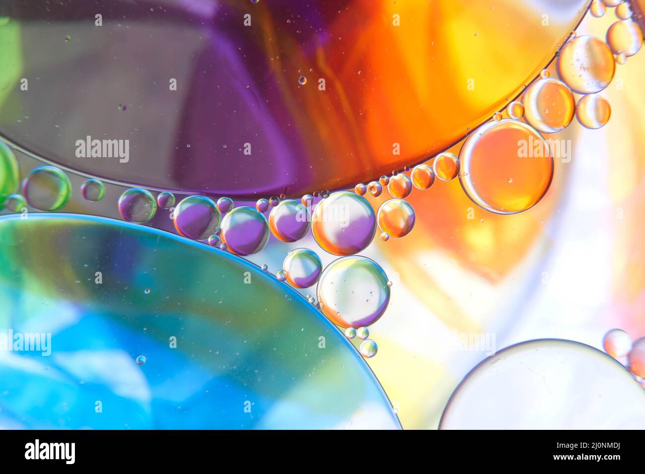 abstract photo of oil drops float on a water Stock Photo