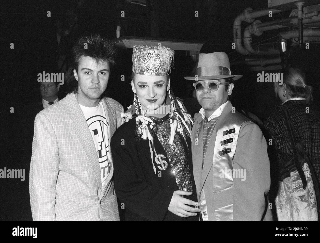 Singer Boy poses with Paul Young (left) and Elton John (right