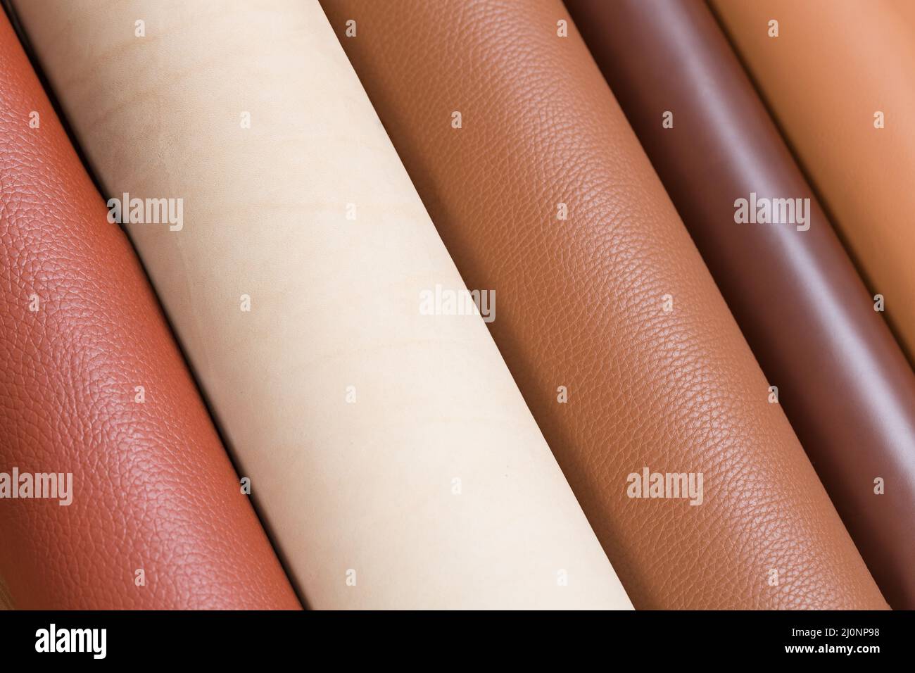 Multicolored rolls of leather. Can be used in design projects Stock