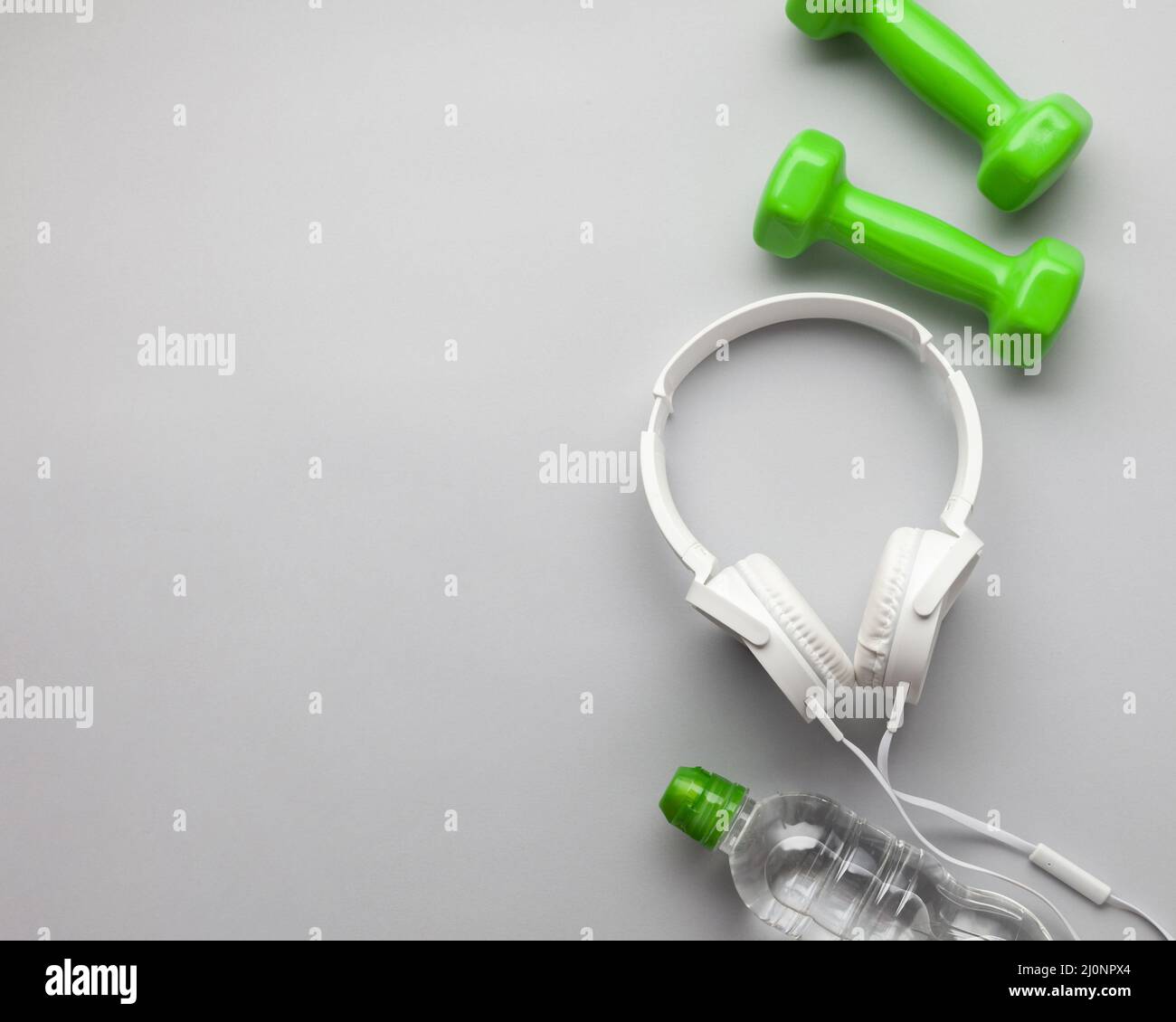 Top view arrangement with green dumbbells copy space. High quality and resolution beautiful photo concept Stock Photo