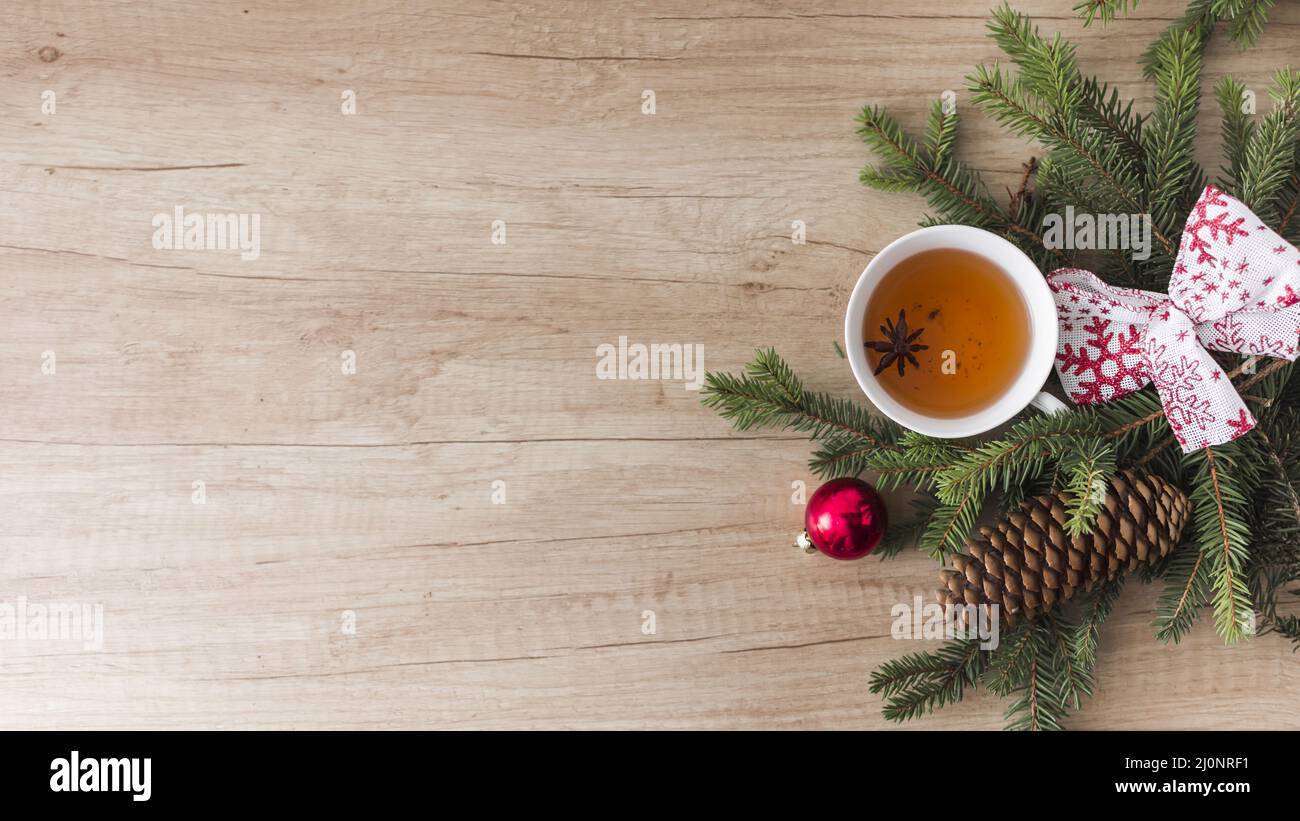 Mug drink near coniferous twigs snags . High quality and resolution beautiful photo concept Stock Photo