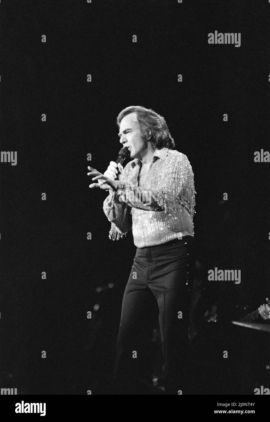 American singer Neil Diamond in concert at the NEC Arena, Birmingham. 2nd July 1984. Stock Photo