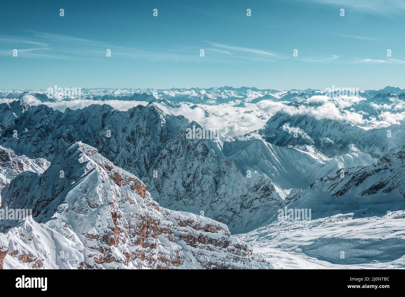 Mountain panorama from the viewing platform on the Zugspitze. German and Austrian ski areas. Stock Photo
