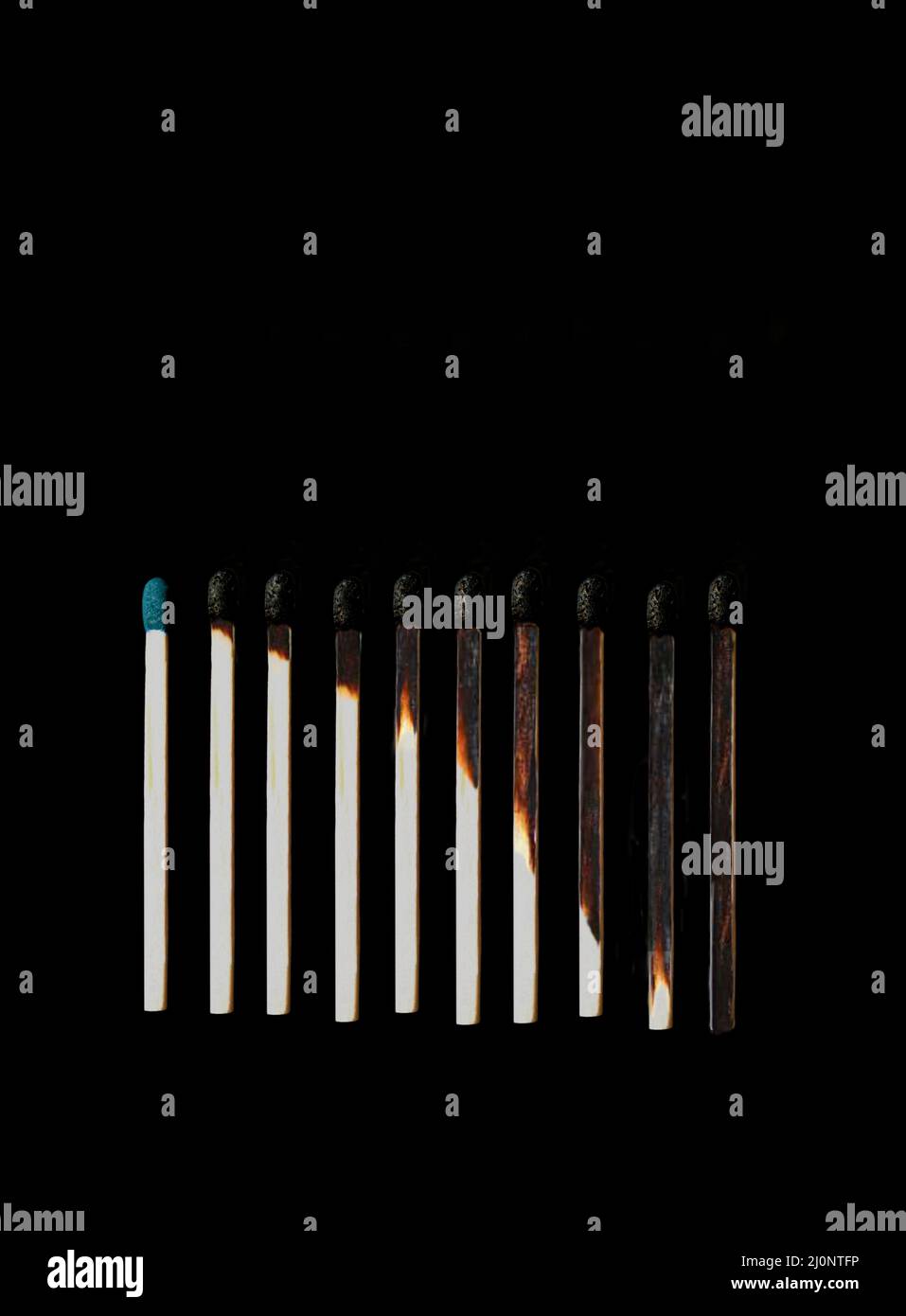 Match stick burning. Match stick in black background. Different stages of match sticks burning. Match stick.  Burnt matchsticks in black background . Stock Photo