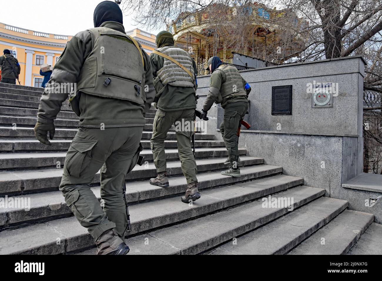 18 March 2022 Odessa, Ukraine Dima, a young man (with orange vest