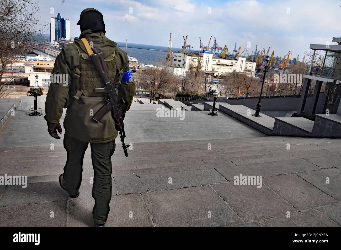 18 March 2022 Odessa, Ukraine Dima, a young man (with orange vest