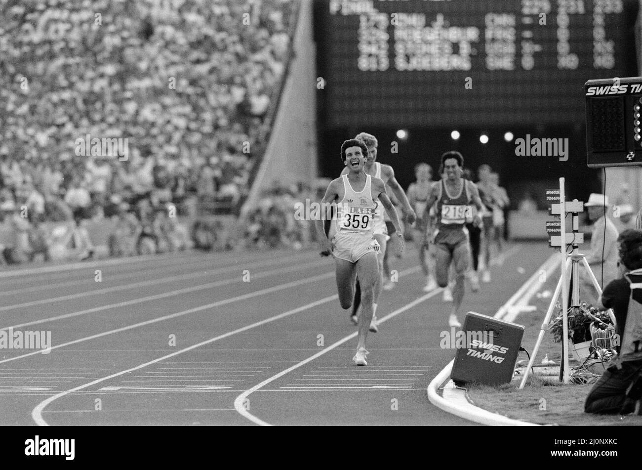 1984 Olympic Games in Los Angeles, USA.Mens Athletics. Great Britain's Sebastain Coe wins the 1500 metres gold medeal ahead of his fellow countryman Steve Cram who took silver. 11th August 1984. Stock Photo