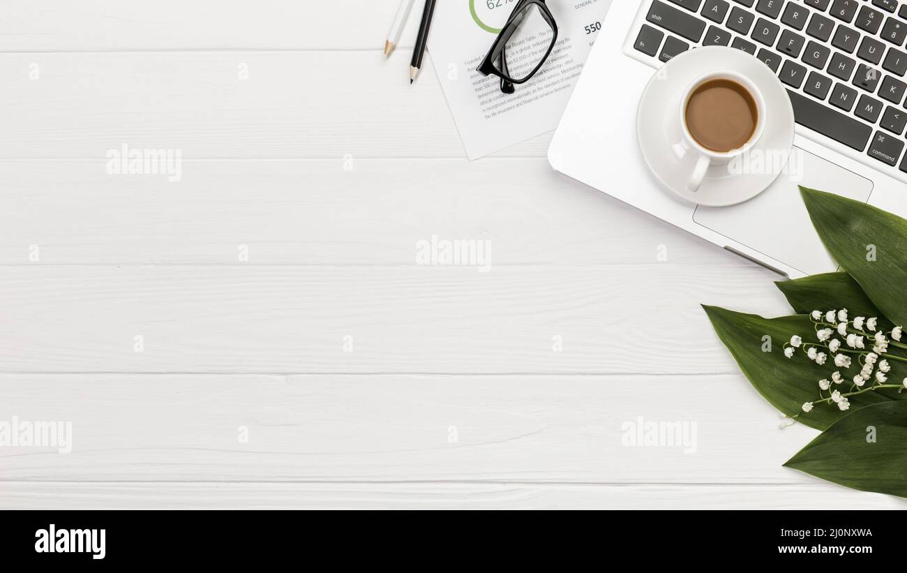 Overhead view spiral notepad laptop with coffee cup desk . High quality ...