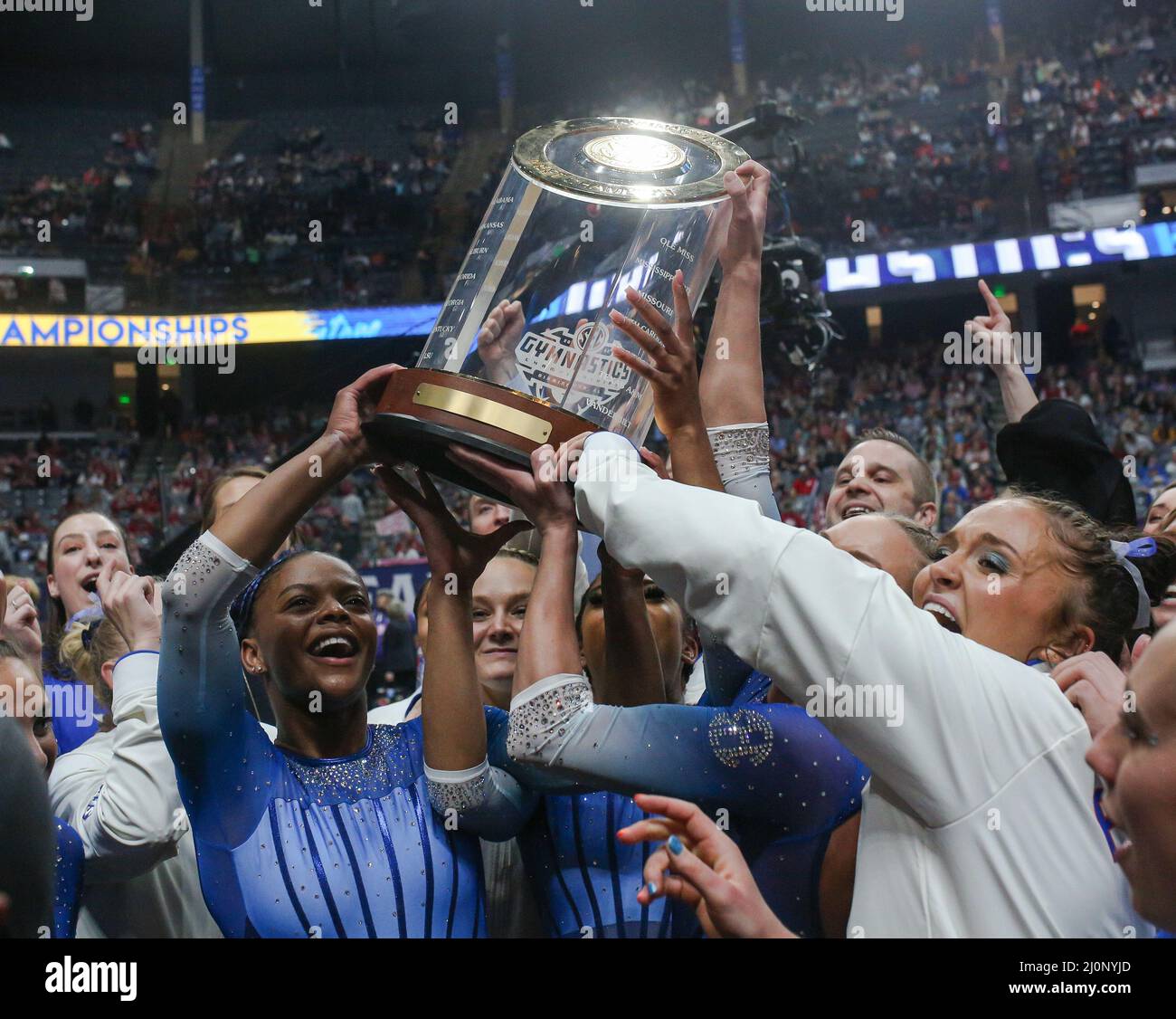 March 19, 2022 The Florida women's gymnastics team lifts up the SEC