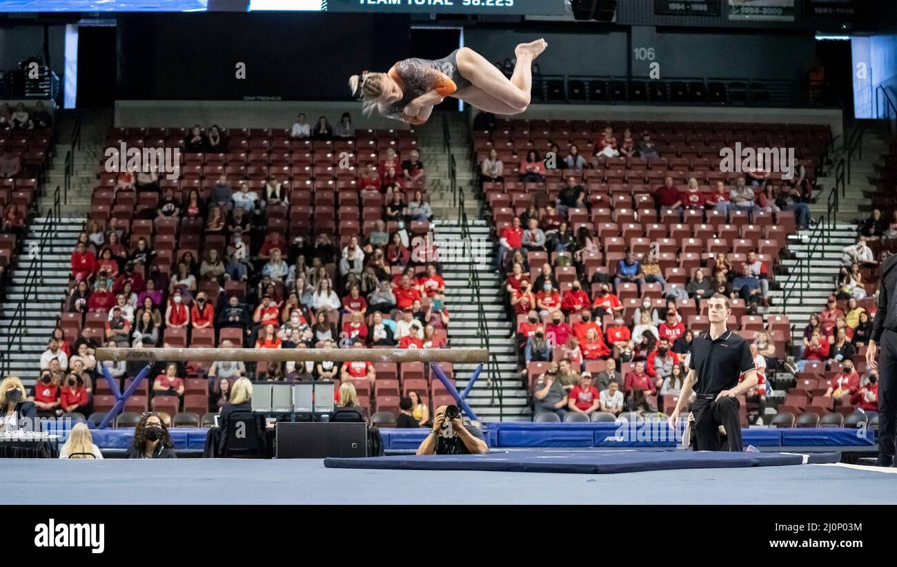 Oregon State University's Jade Carey, the 2020 Olympic gold medalist on floor exercise, catches major air on a twisting double in floor exercise, tying for first with fellow Olympian Grace McCallum and winning both the all around and Pac12 Gymnast of the Year at the Pac12 Women's Gymnastics Championship at Maverik Center in Salt Lake City, Utah on March 19, 2022 (photo by Jeff Wong/Sipa USA). Stock Photo