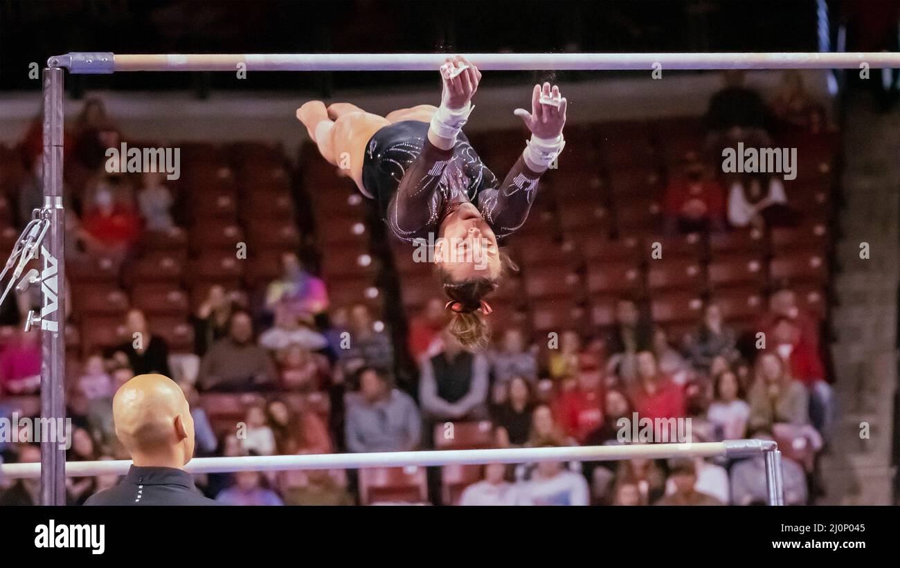 The University of Utah's Maile O'Keefe swings from the high bar to the low on the uneven parallel bars and scores a 9.825 taking third in the all around competition, at the Pac12 Women's Gymnastics Championship at Maverik Center in Salt Lake City, Utah on March 19, 2022 (photo by Jeff Wong/Sipa USA). Stock Photo