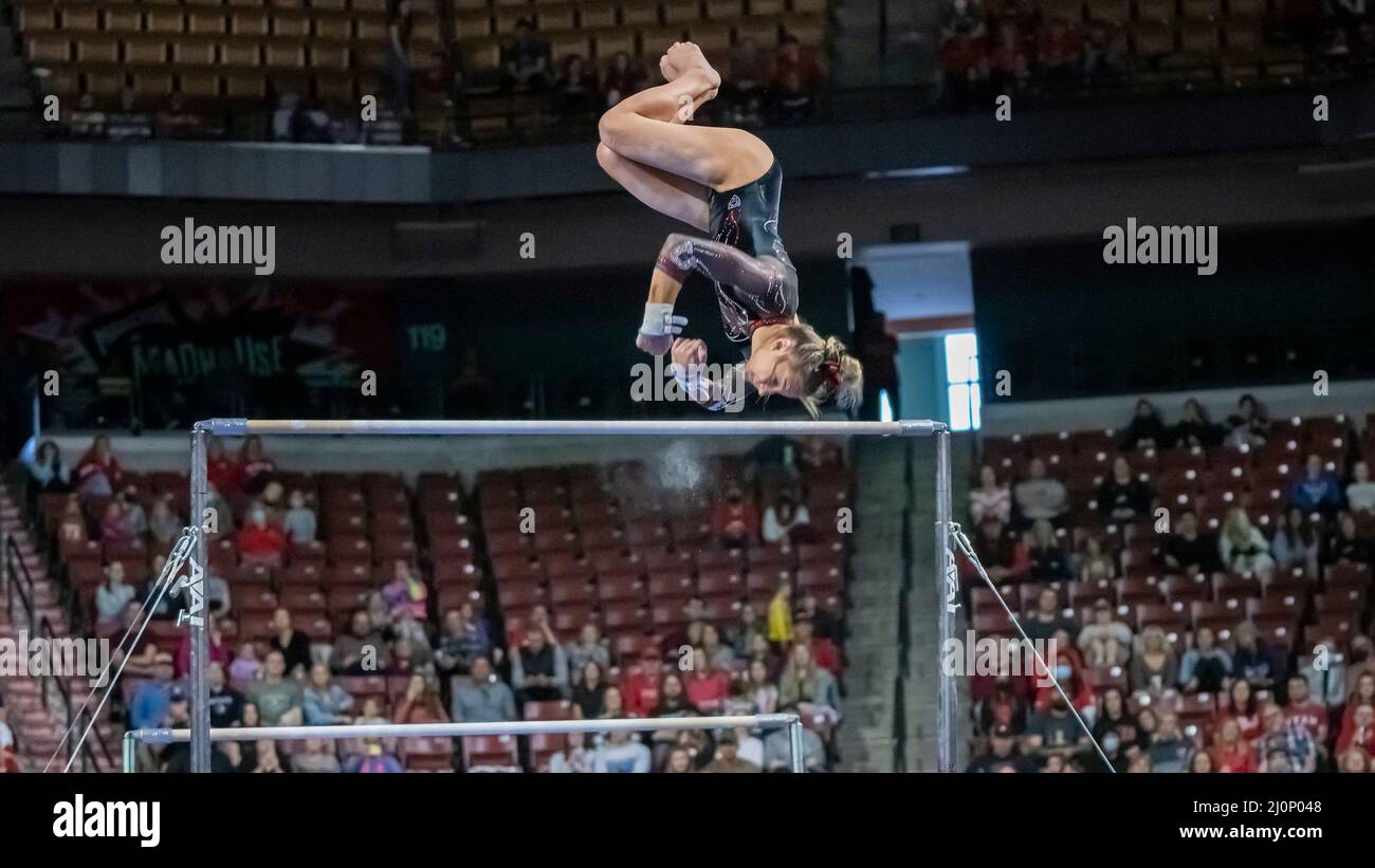 The University of Utah's Grace McCallum, a 2020 Olympic team silver medalist and 2019 US Team champion, flawlessly executes a twisting double for her dismount and scores a perfect 10.0 at the Pac12 Women's Gymnastics Championship at Maverik Center in Salt Lake City, Utah on March 19, 2022 (photo by Jeff Wong/Sipa USA). Stock Photo