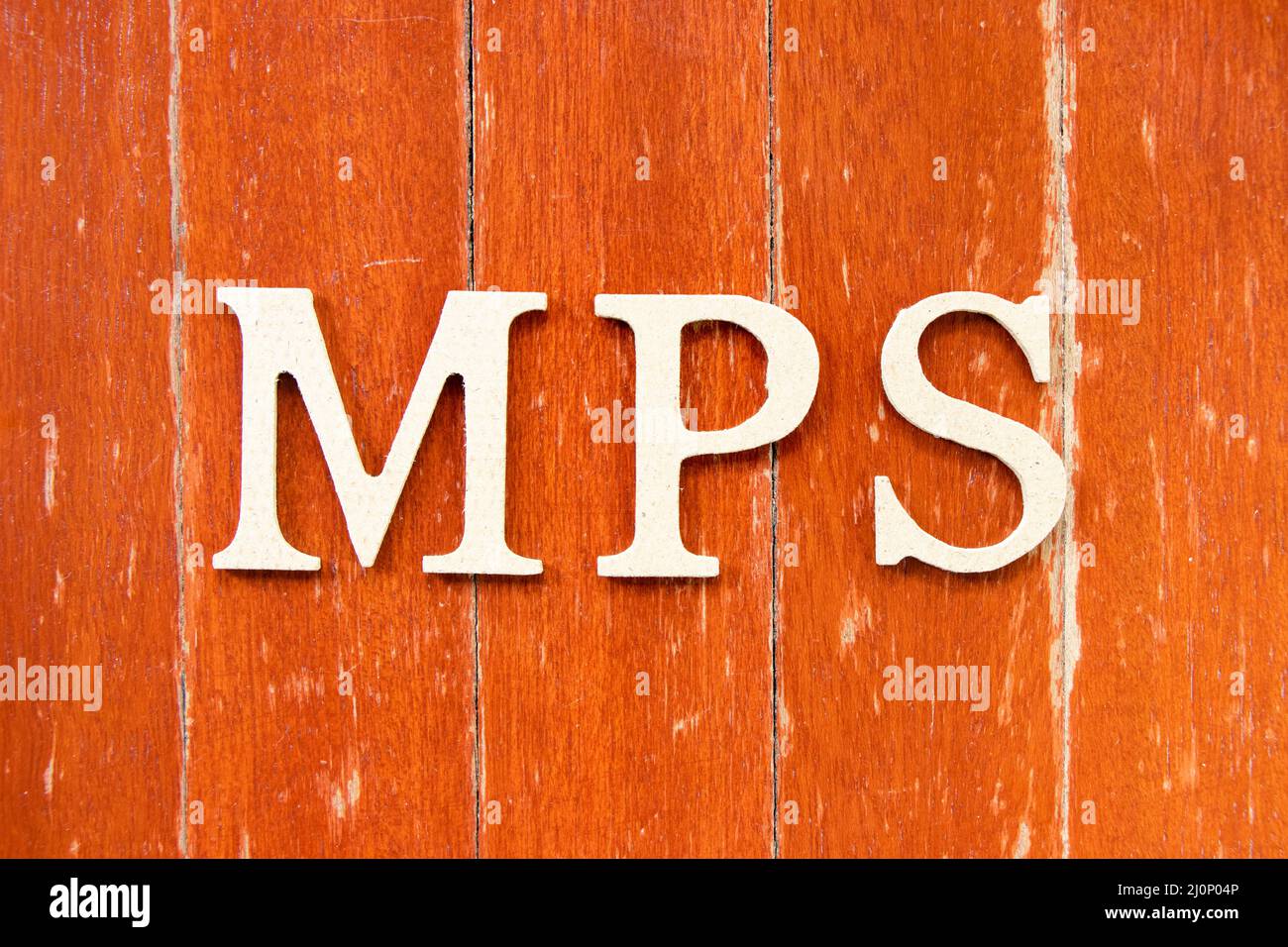 Alphabet letter in word MPS (Abbreviation of Master Production Schedule or Mucopolysaccharidosis) on old red color wood plate background Stock Photo