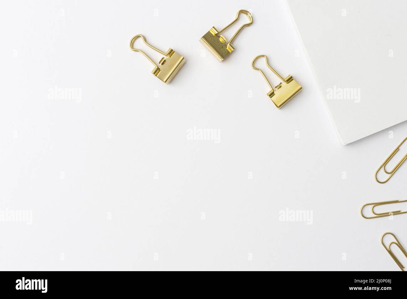Paperclip Top Top view golden paperclips with copy space. High quality and resolution ...