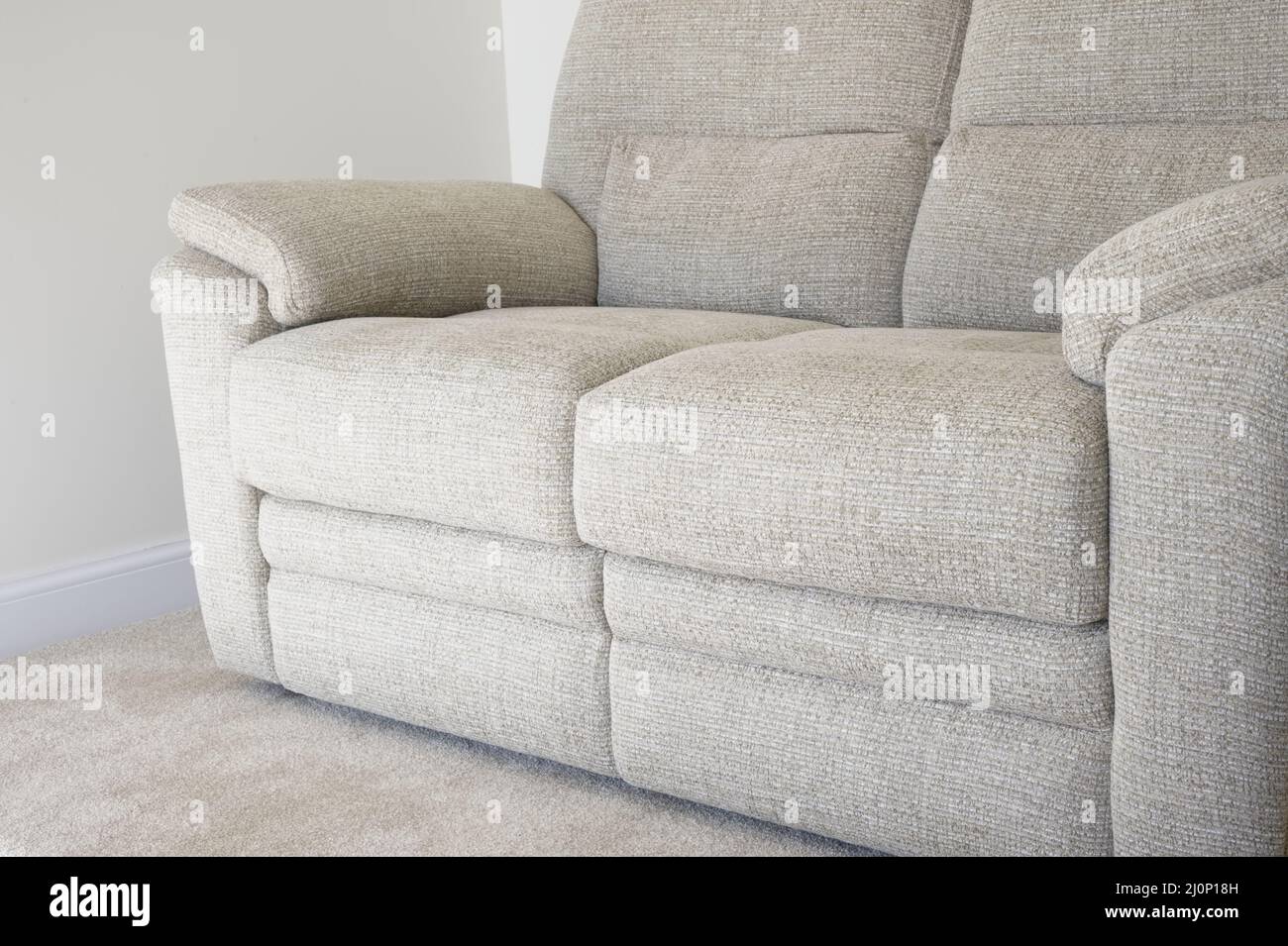Neutral colour home interior showing sofa and carpet Stock Photo
