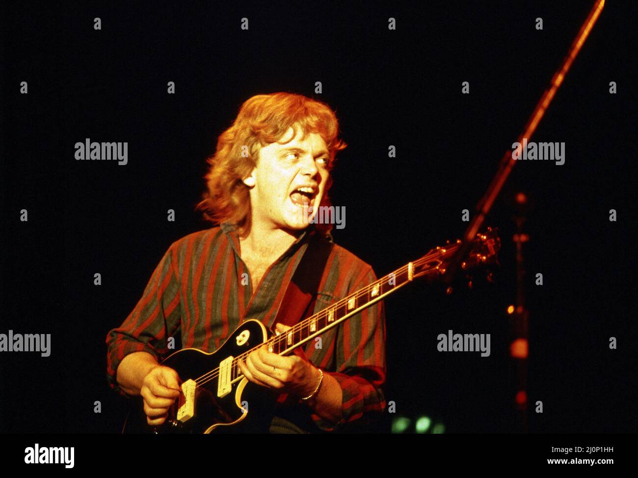 Canadian rock band Saga in concert at Hammersmith Odeon. Guitarist Ian Crichton. 10th November 1983. Stock Photo