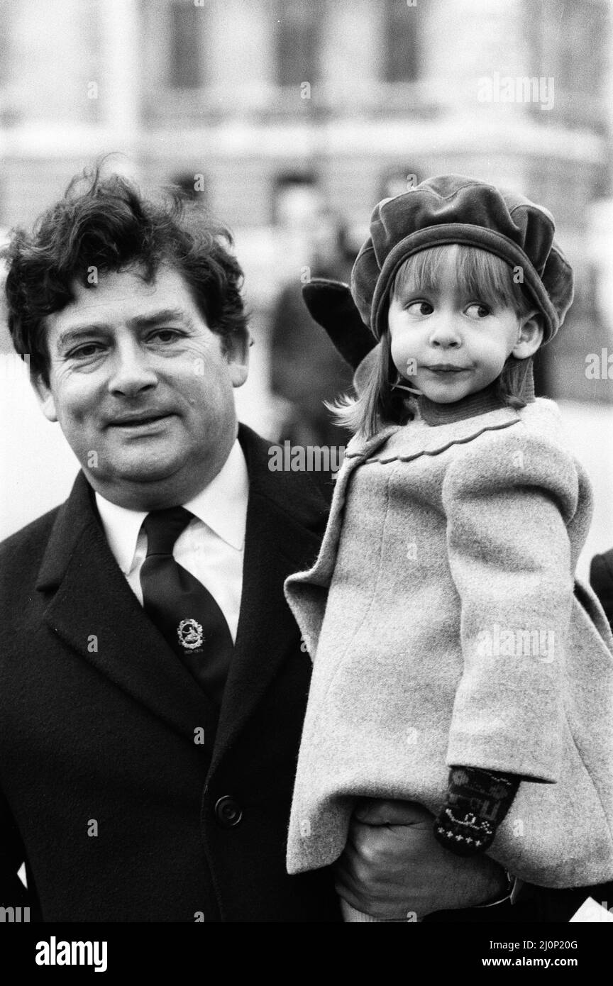 Chancellor of the Exchequer Nigel Lawson enjoys a pre-Budget walk with his family in St James's Park, London. He is pictured with his daughter Emily. 13th March 1984. Stock Photo