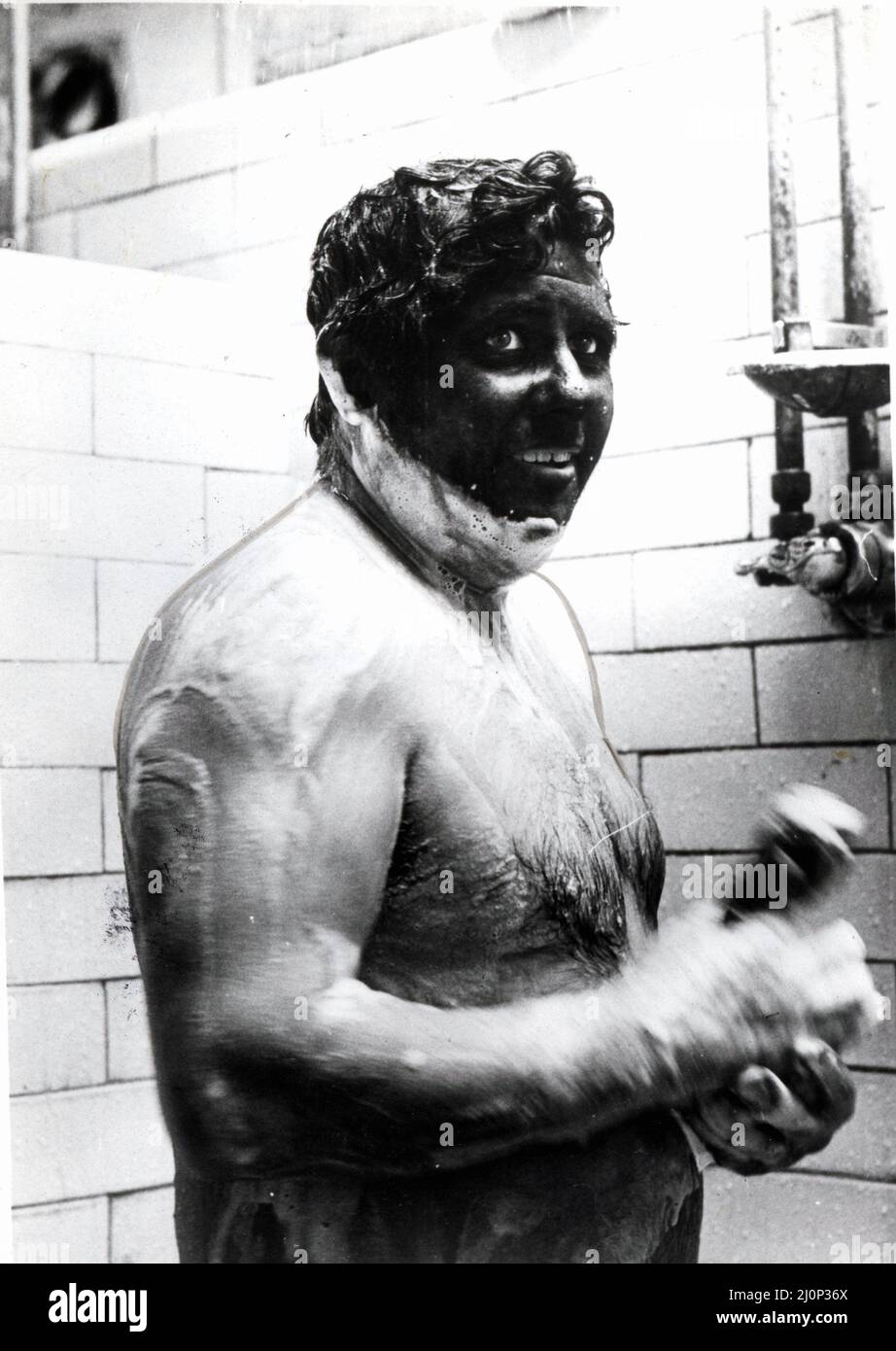 Coal - Miners - Bath time for Gordon Davies after a day down below at Lewis Merthyr Colliery - 4th July 1983. Stock Photo