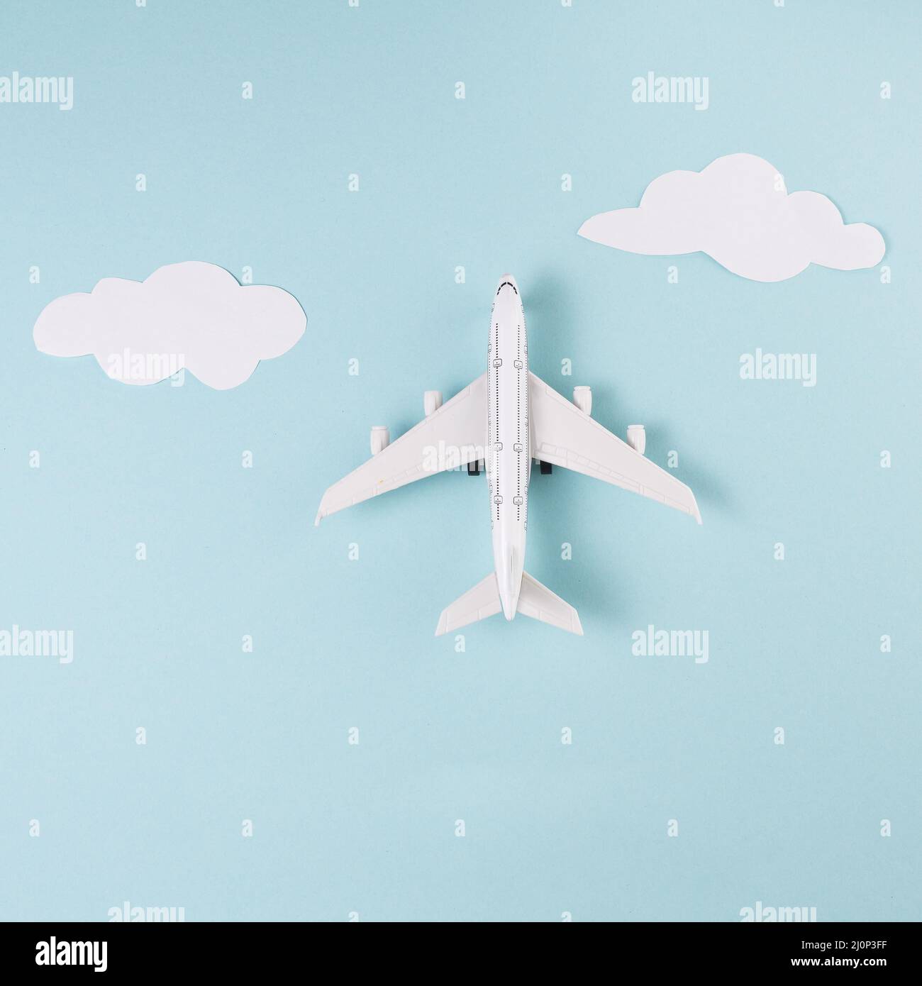 Toy plane clouds blue background. High quality and resolution beautiful