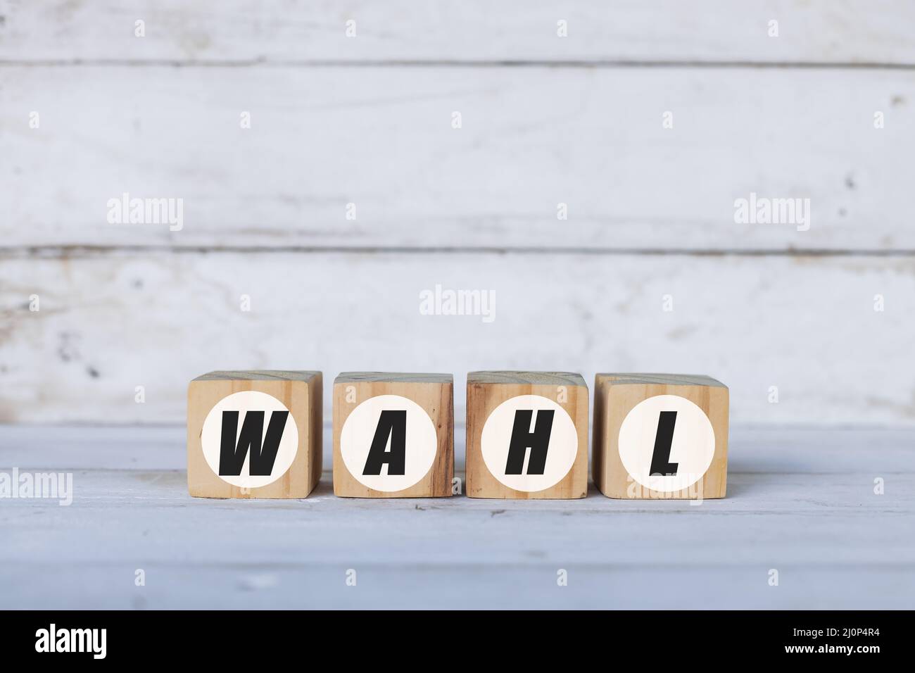 wahl concept written on wooden cubes or blocks, on white wooden background. Stock Photo