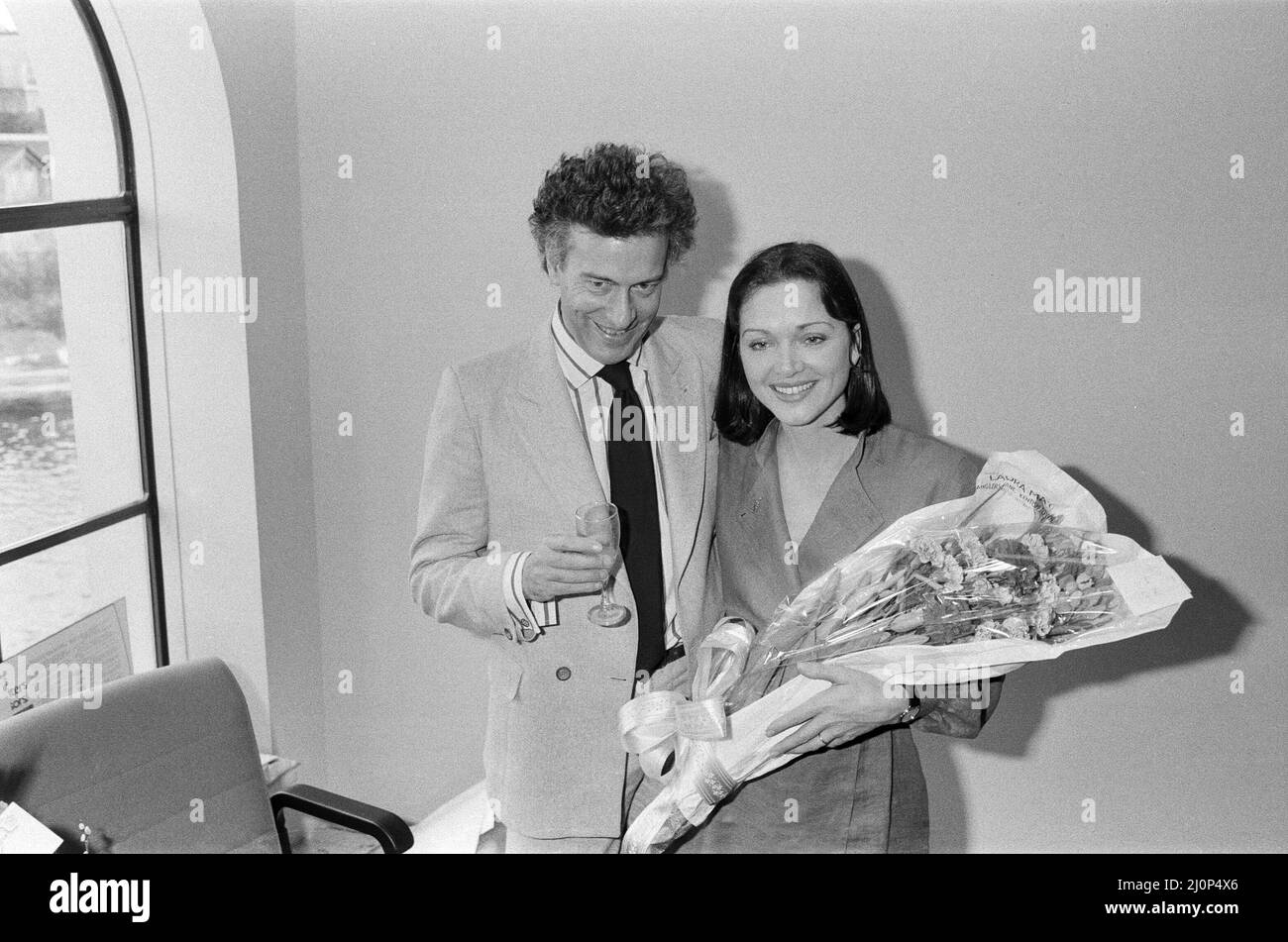 Anna Ford and Mark Boxer at the TV-am studios. 1983. Stock Photo