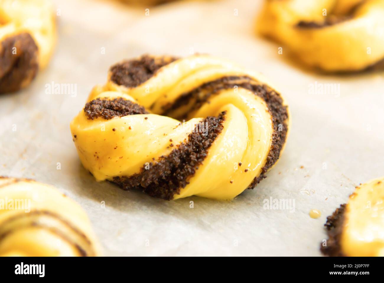 Raw buns rolls in bread bakery Stock Photo