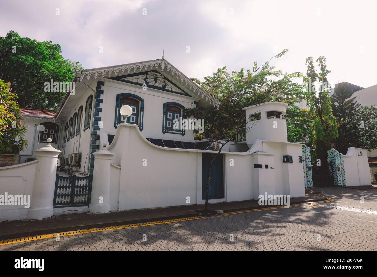 White Gates and Building of the Old Friday Mosque or the Malé Hukuru Miskiy  in the city of Male, Kaafu Atoll Stock Photo