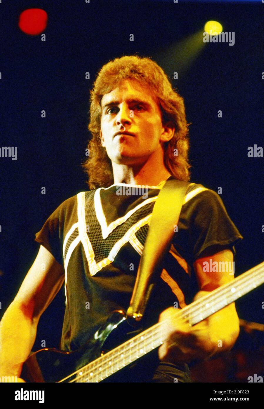 Canadian rock band Saga in concert at Hammersmith Odeon. Pictured, Jim Crichton. 10th November 1983. Stock Photo