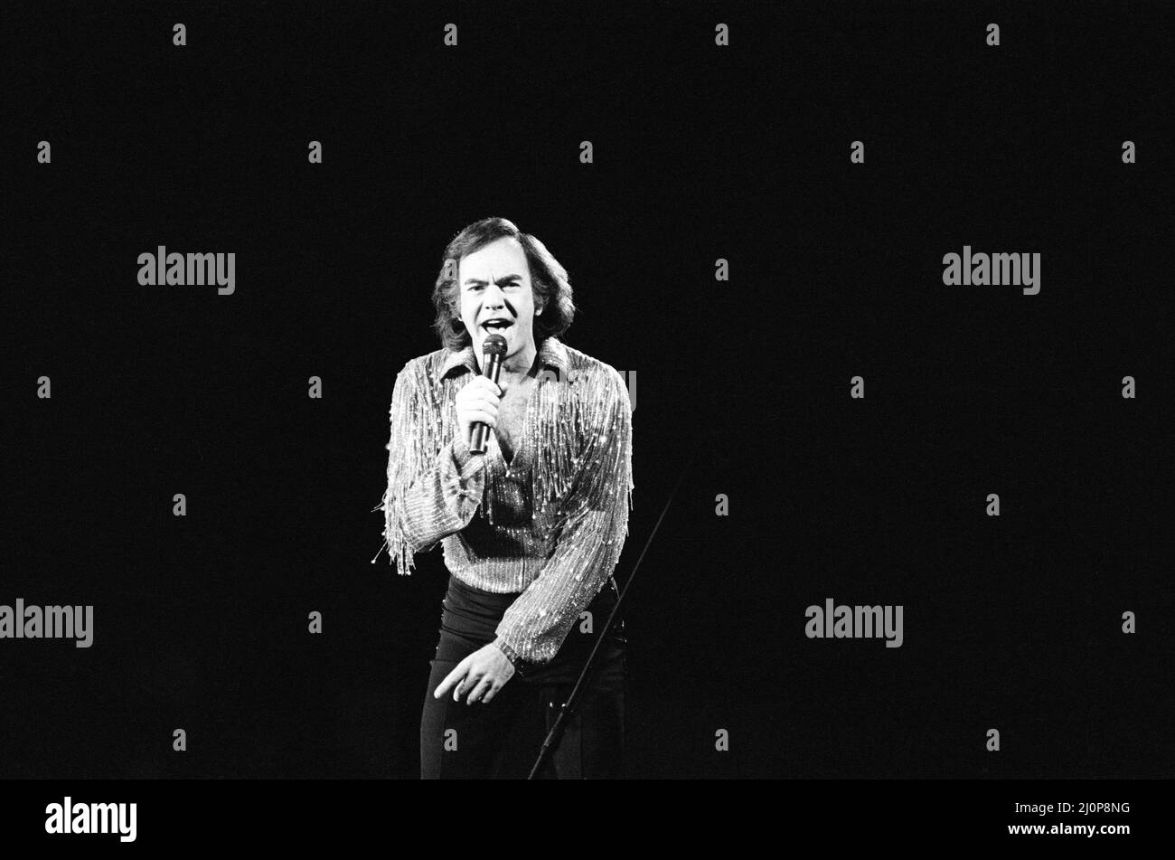 American singer Neil Diamond in concert at the NEC Arena, Birmingham. 2nd July 1984. Stock Photo