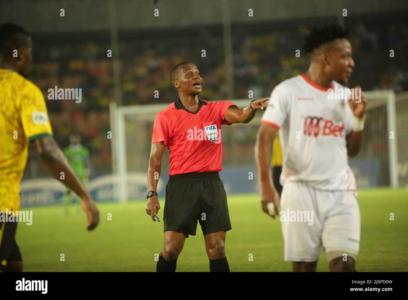 Central referee, Herry Sasii warning a player in a Premier League match in Tanzania Mainland, at Benjamin Mkapa Stadium in Dar es Salaam. PHOTO BY MIC Stock Photo