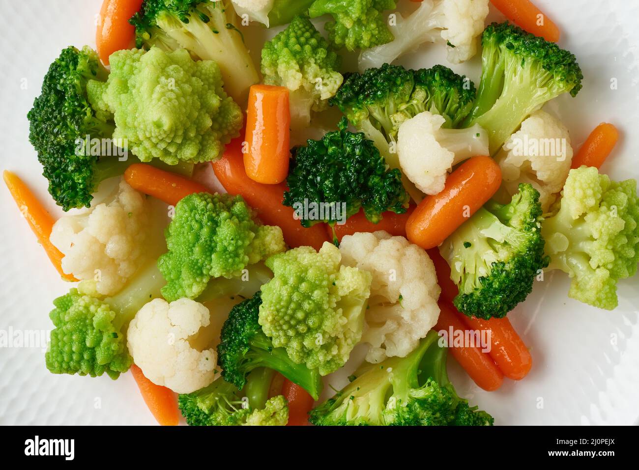 Mix of boiled vegetables. Broccoli, carrots, cauliflower. Steamed vegetables for lowcalorie