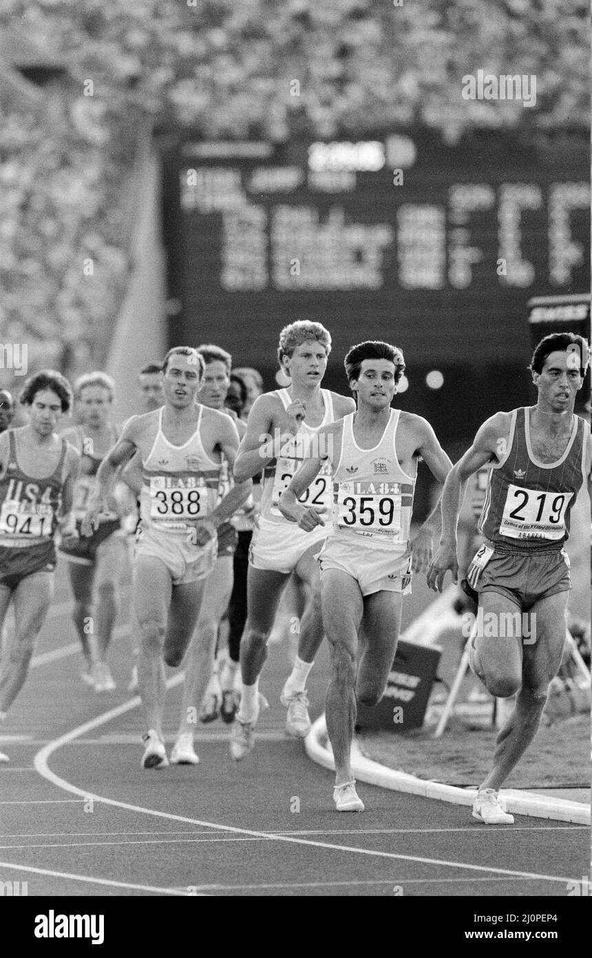 1984 Olympic Games in Los Angeles, USA. Mens Athletics. Great Britain's Sebastain Coe in followed by fellow Brits Steve Cram who took silver and Steve Ovett. 11th August 1984. Stock Photo