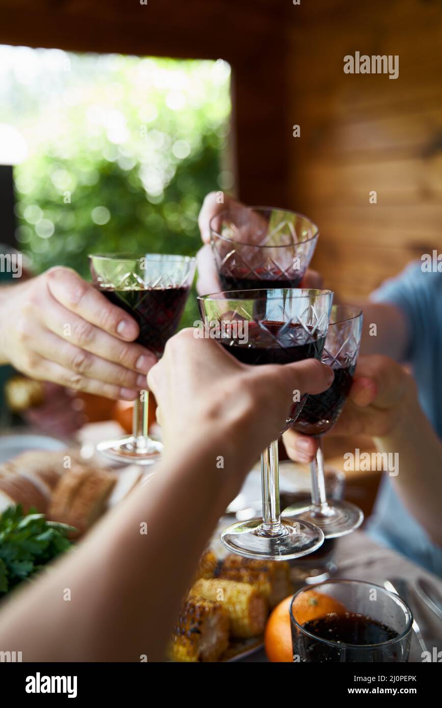 Hands with drinks in glasses celebrate party countryside Stock Photo