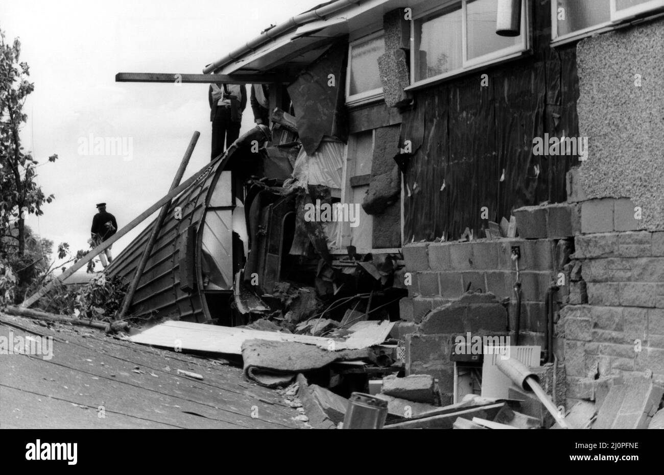 The crash of the Aberdeen to London sleeper train which careered off the track on the notorius Morpeth curve, just half a mile from the station. The crash happened at 10 minutes past midnight on 24th June, 1984   A carriage juts into the livingroom after ploughing into the house. Stock Photo
