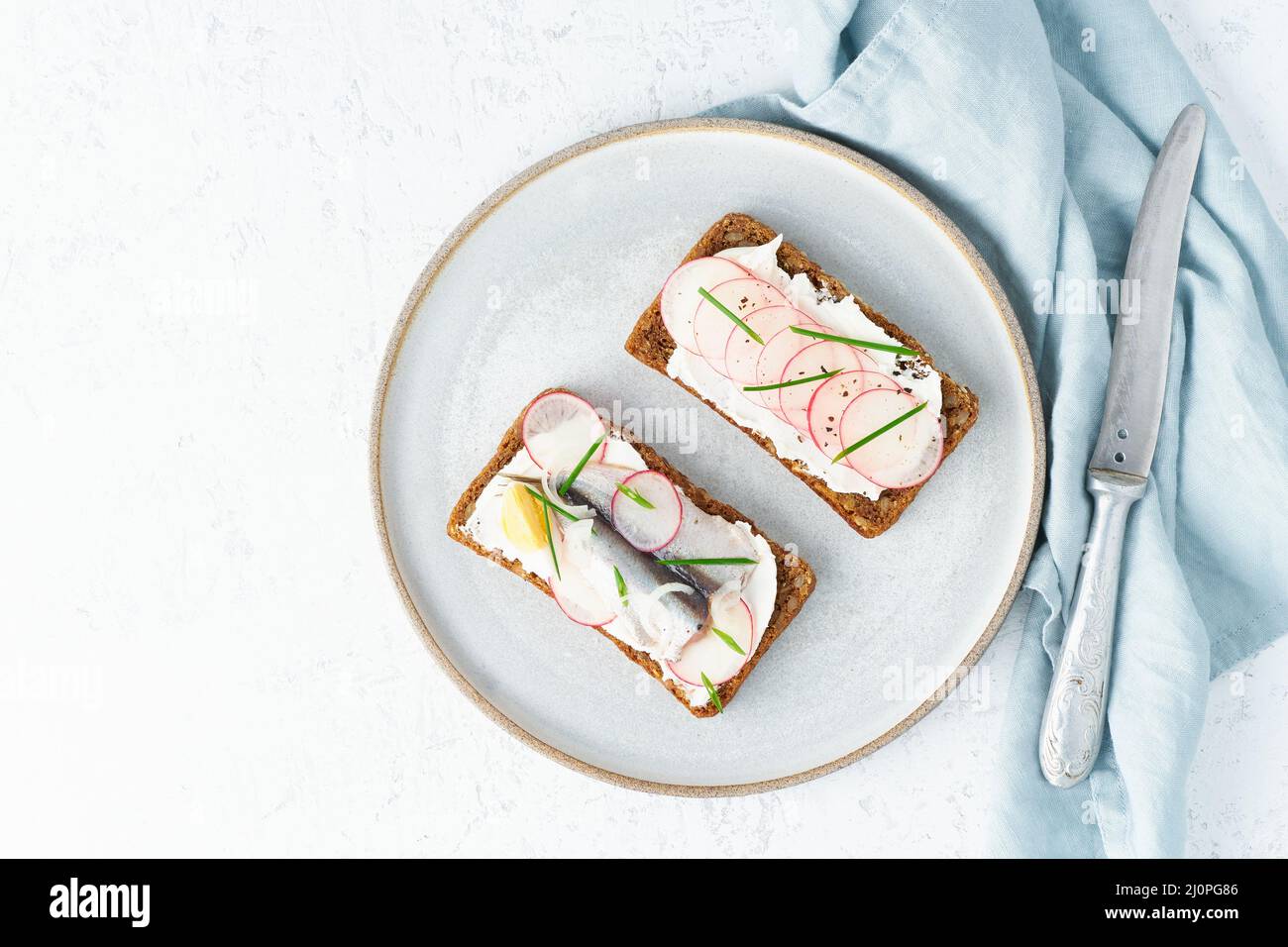 Savory fish smorrebrod, set of five traditional Danish sandwiches. Stock Photo