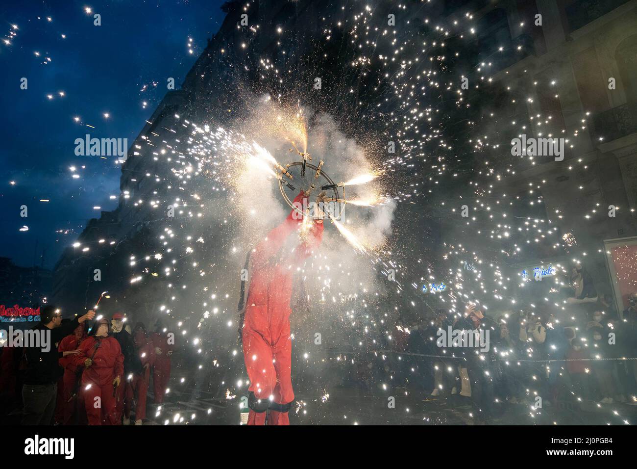 March 19, 2022, Valencia, Spain: A person dressed as a demon holds ...