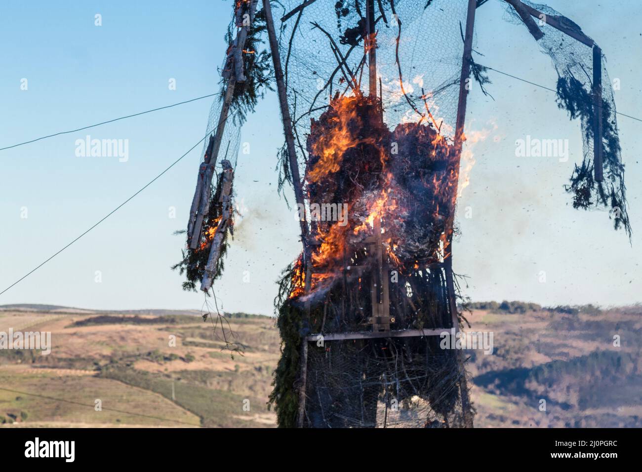 Podence - Traditional Portuguese Carnaval Queima do Entrudo ('burning the wicker man'), which signals the end of the festival. Stock Photo