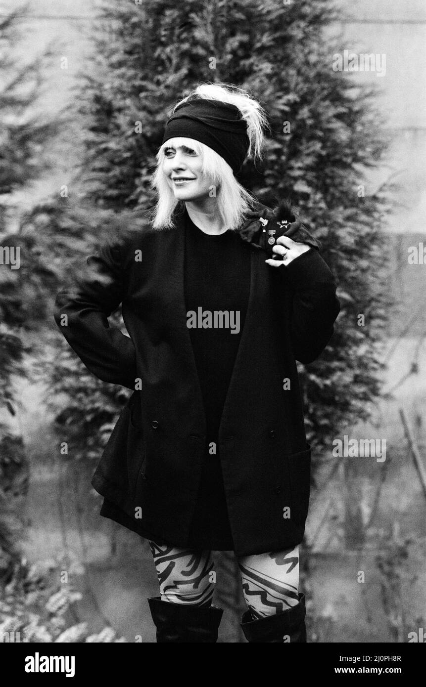 Debbie Harry pictured in London promoting her film Videodrome.  At this point, Blondie were not active as a band since the early 1982.  Though they did release new material in 1999.  Deborah Ann Harry (born Angela Trimble -  July 1, 1945) is an American singer, songwriter and actress, known as the lead vocalist of the band Blondie. Her recordings with the band reached No.?1 in the US and UK charts on many occasions from 1979 to 2017.  Blondie hits include Denis, Call Me, Hanging On The Telephone, Heart of Glass, Sunday Girl, Rapture and Atomic amongst many others.  Picture taken 21st November Stock Photo