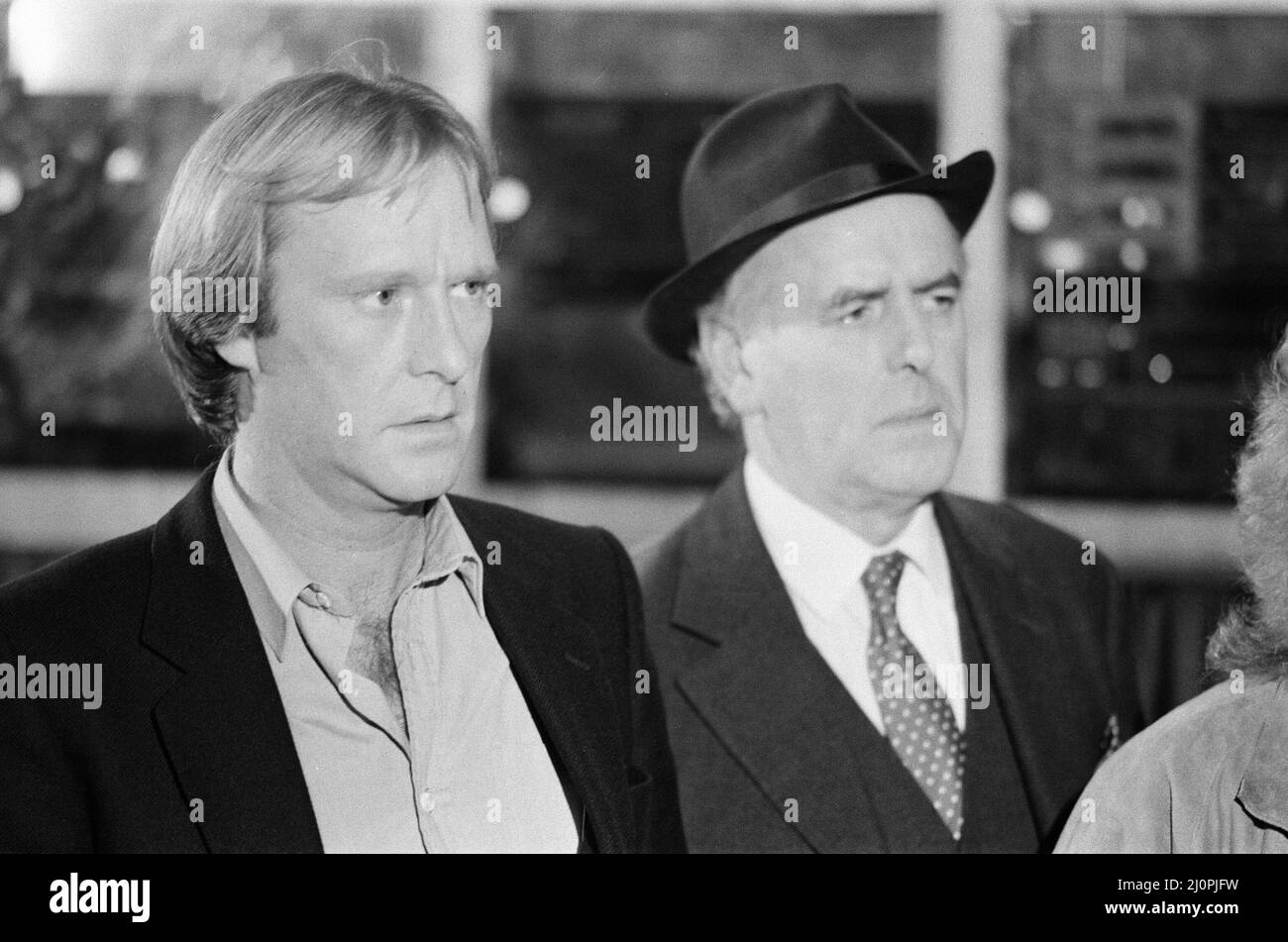 Behind the scenes filming of Minder, a British comedy drama TV Series set in the London criminal underworld, fourth series, episode 'A Star is Gorn', pictured Thursday 22nd September 1983. Our Picture Shows ... George Cole (right) as Arthur Daley and Dennis Waterman as Terry McCann. Stock Photo