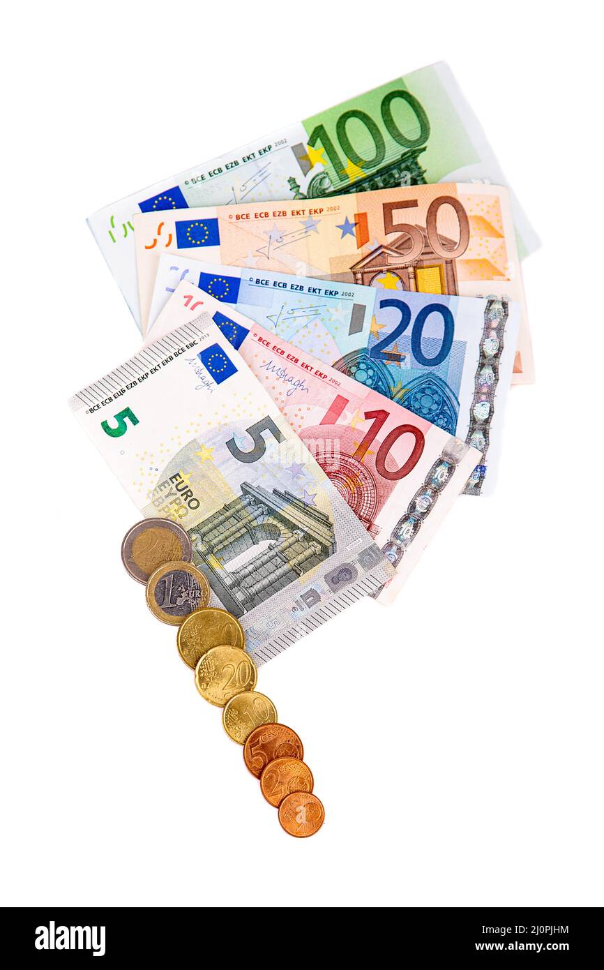 Denumeration Banknotes and euro coins of different denominations lie in a fan ...