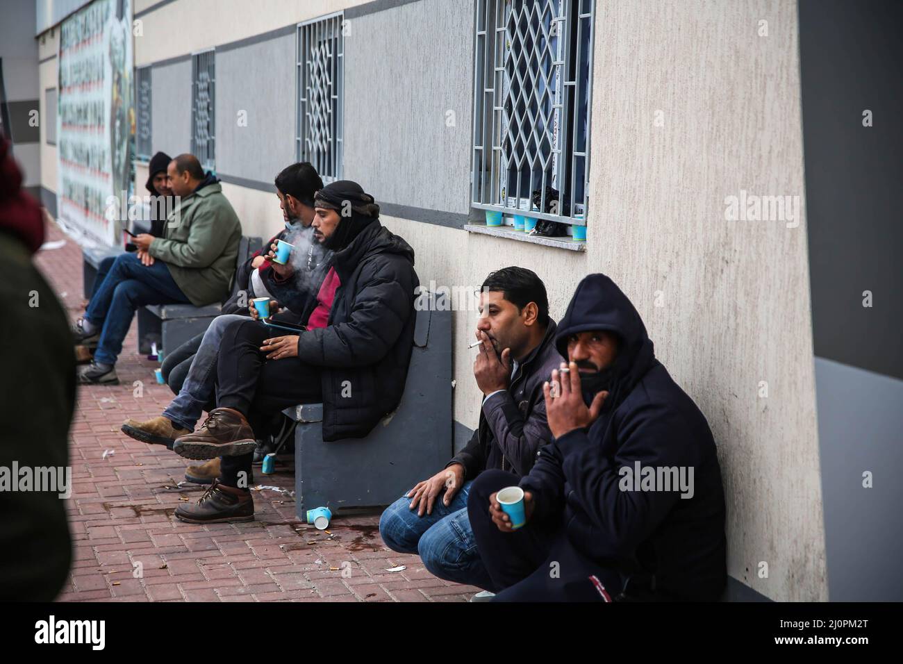 March 20, 2022, Gaza, Palestine: Palestinian workers wait at the Erez crossing as they prepare to leave Beit Hanun in the northern Gaza Strip. Palestinian workers leave Beit Hanun in the northern Gaza Strip through the Erez crossing to go and work in Israel, Israeli authorities said that last week an additional 2,000 Gazans will be allowed into Israel to work, bringing the total permits to 12,000. This is in accordance with the understanding between Hamas and Israel which was sponsored by Egypt and Qatar after the war that flared in May 2021, between Israel and Hamas in the Gaza strip. (Credit Stock Photo